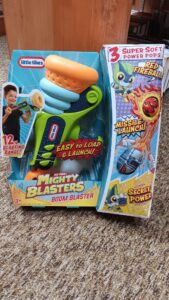 Soft ball shooting toy in package